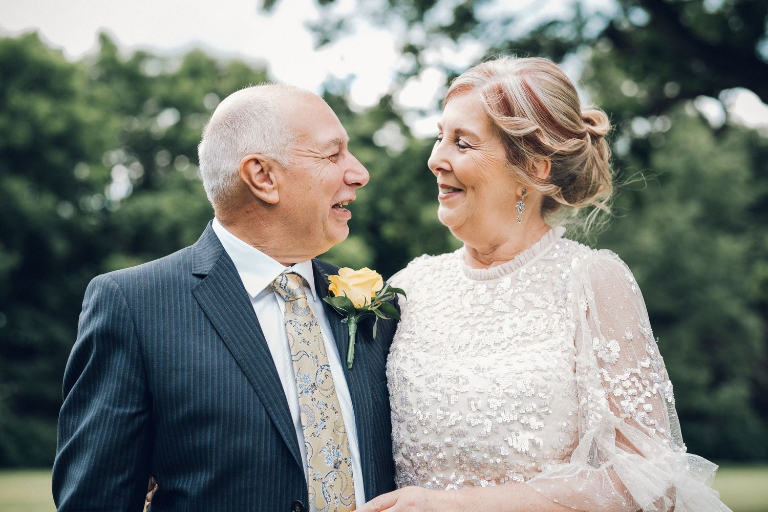 A second chance at happiness for this lovely couple. Loose, soft waves and light makeup for the beautiful bride.