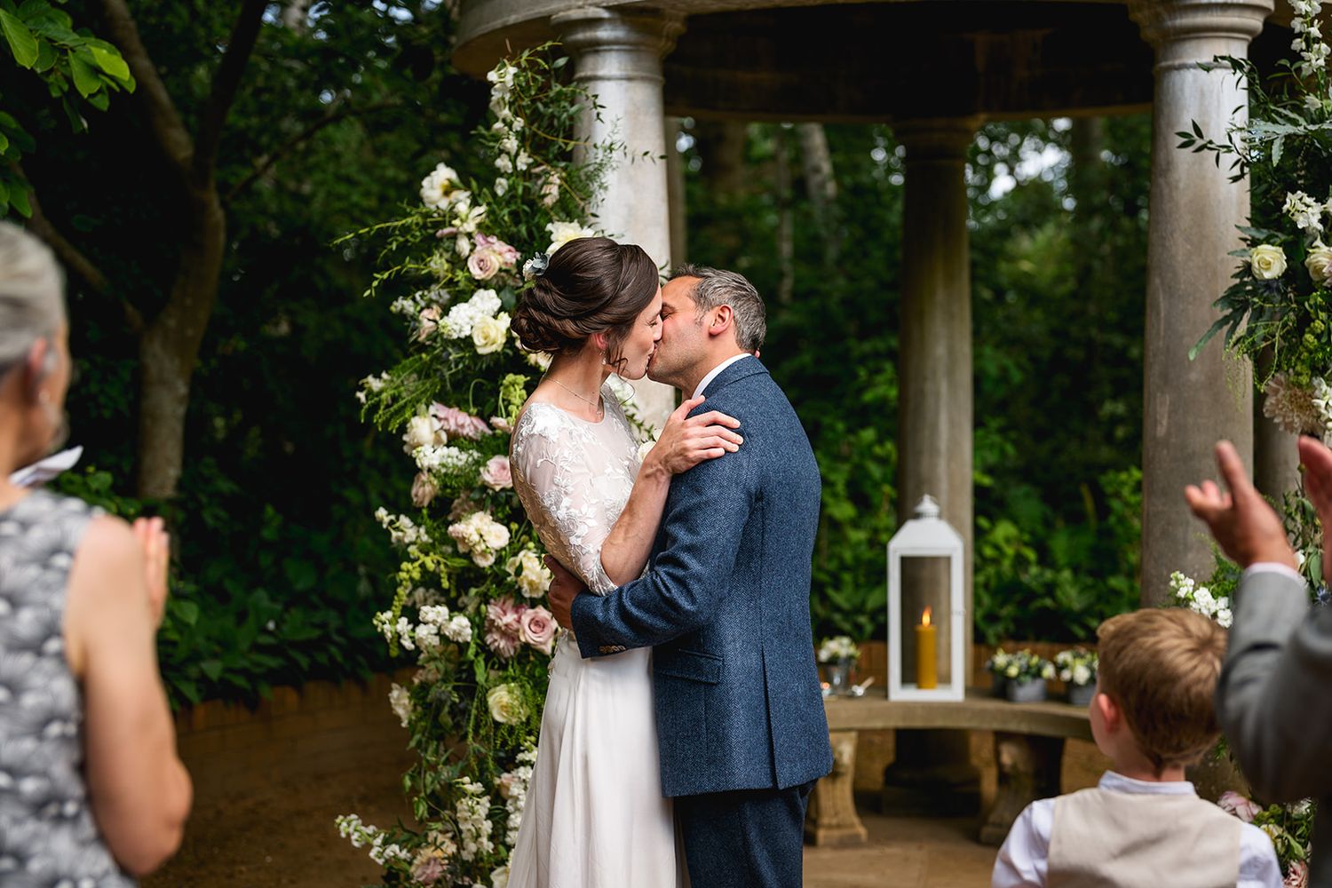 Sealed with a kiss. Wisley RHS, a breath taking venue for a Summer wedding