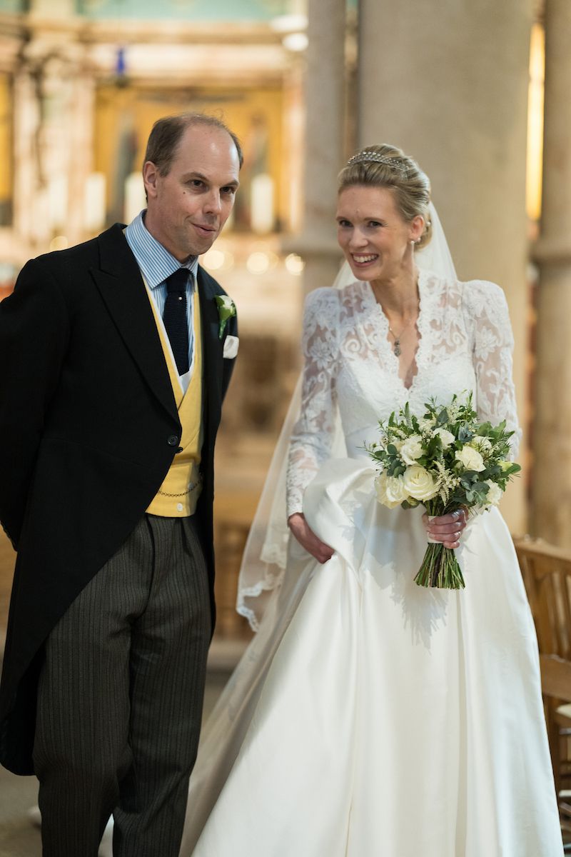 An aristocractic wedding in Central London. Simple, low chignon and diamond tiara for a classic bride.