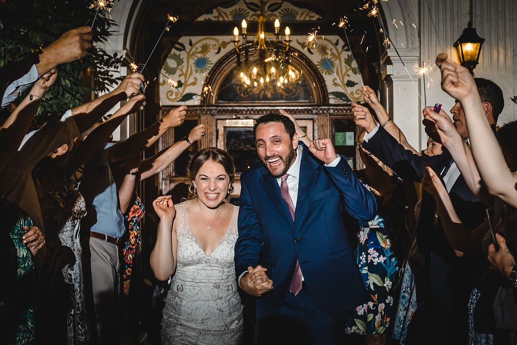 A sparkler arch for this fun loving couple