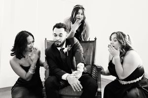 Black and white candid shots show emotional reactions and embraces during an intimate gathering.
