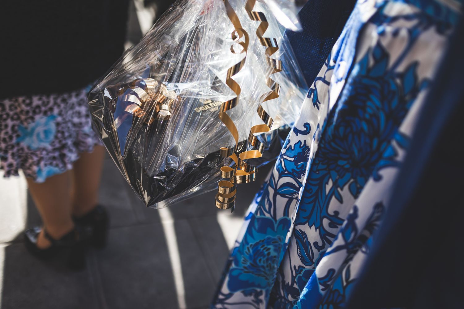 Shiny metallic blue and silver foil balloons arranged in a festive party decoration display.