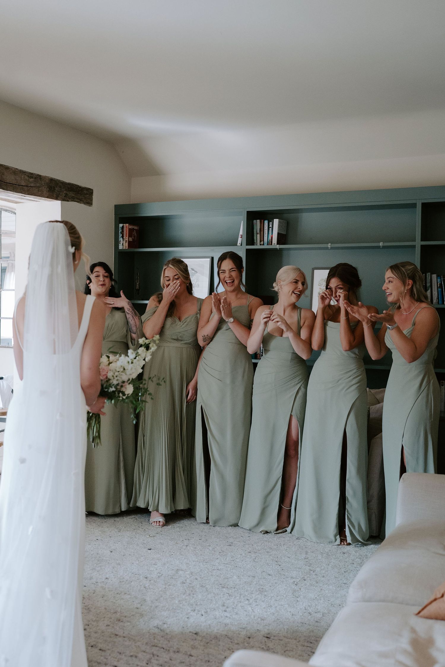 bridesmaids emotional first look with bride at ivy lodge in cirencester