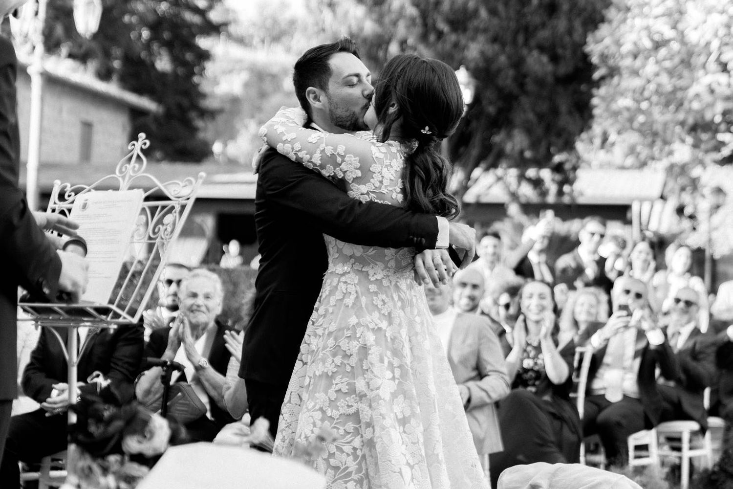 Bride and groom celebrating with guests at a wedding reception