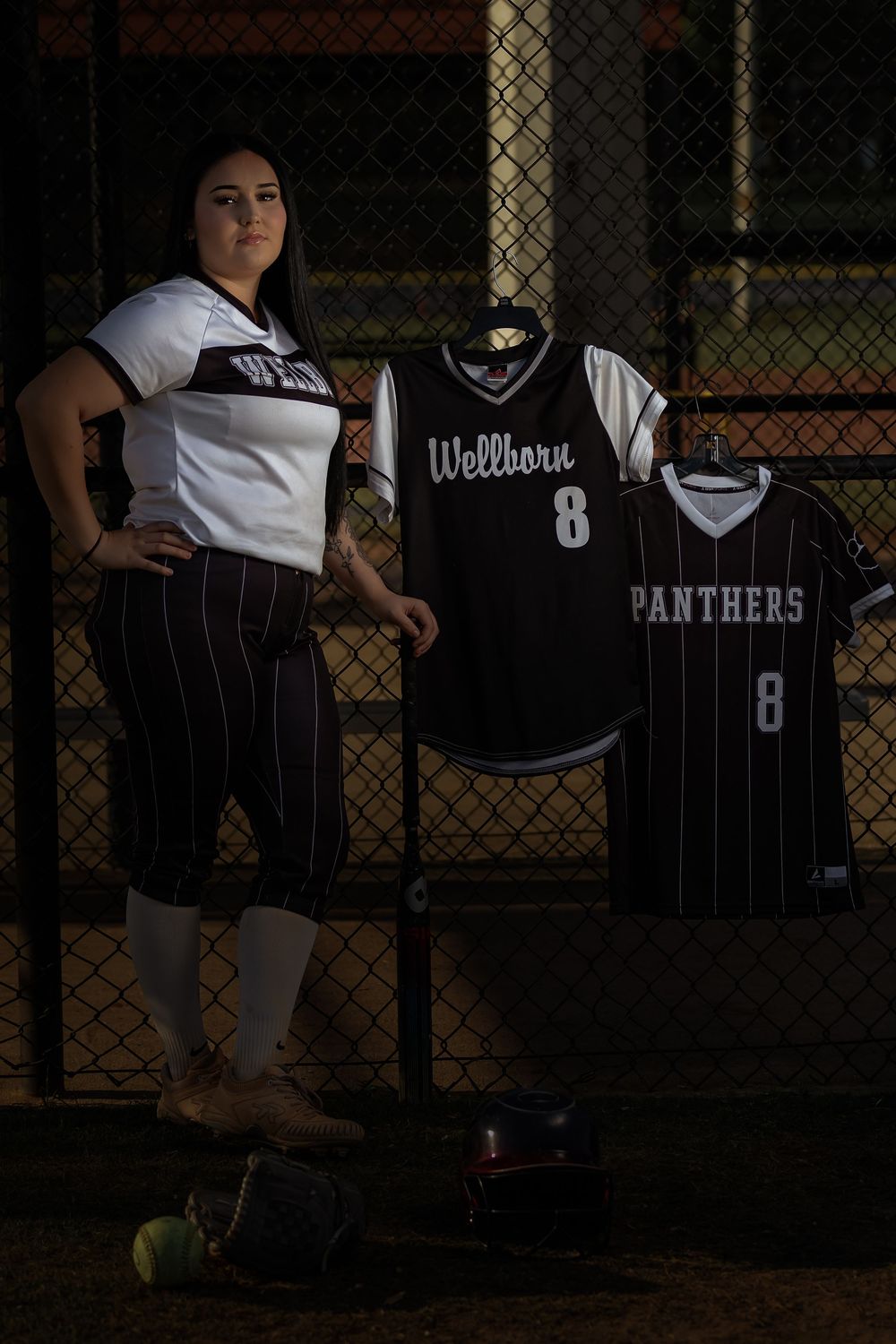 Lincoln, Alabama youth sports photographer capturing professional female athlete portraits with team jerseys.
