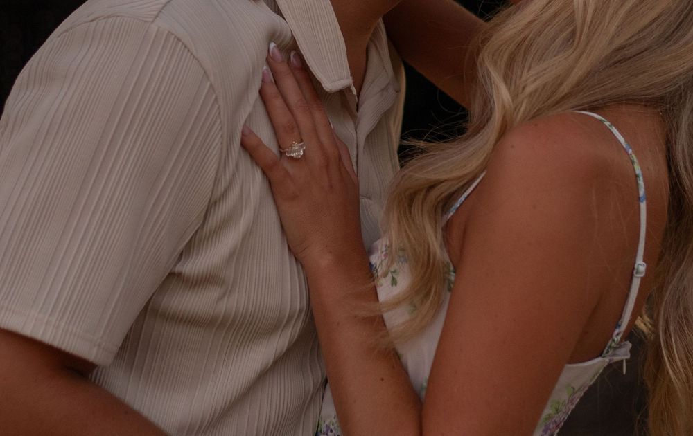 A wedding ceremony sequence shows hands exchanging rings and sharing an intimate moment at the altar.