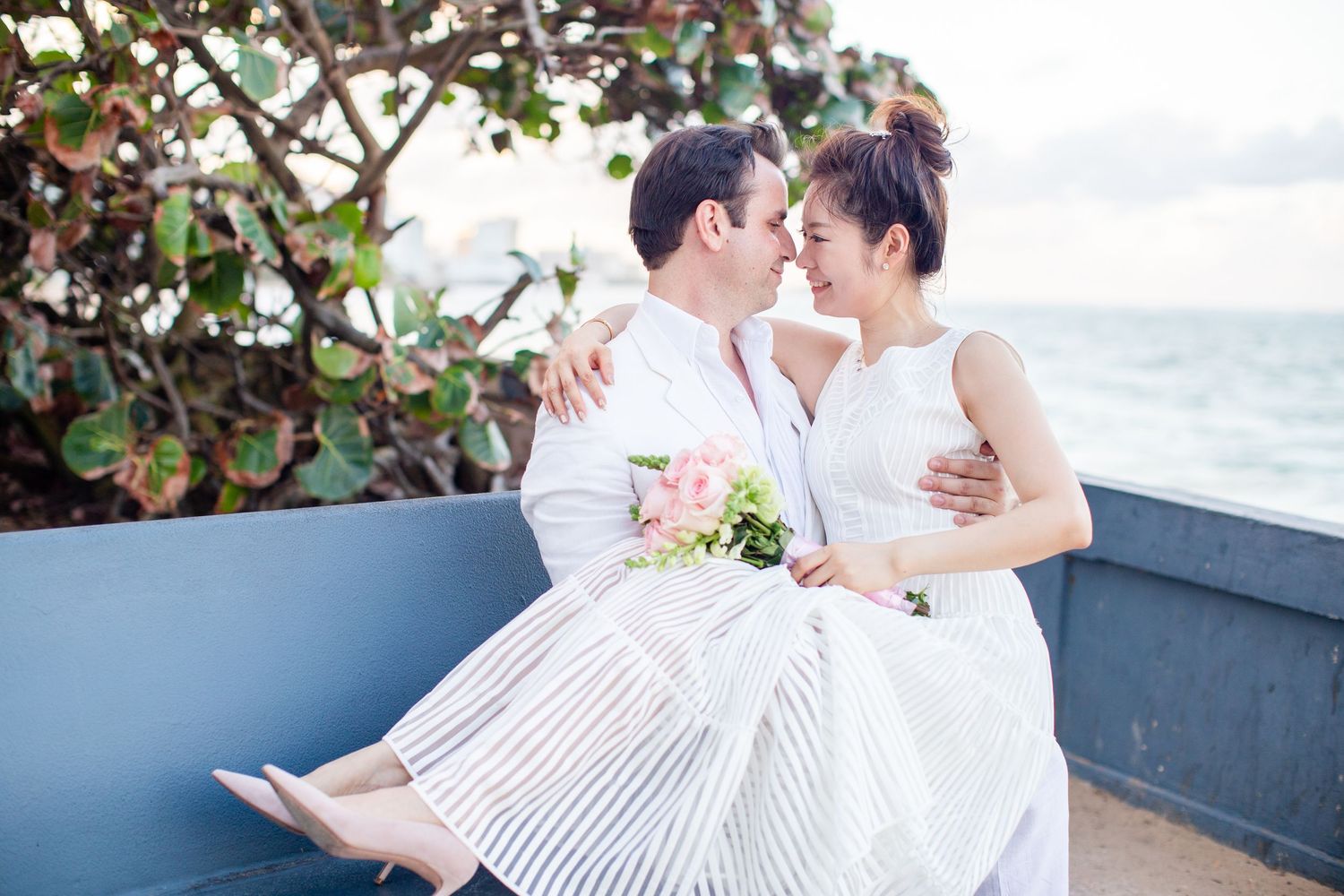 Bride and groom at the beach. Micro wedding in San Juan, Puerto Rico.