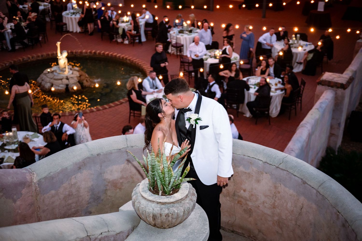 Luxury wedding photographers in Florida captured The Kiss at the Howey Mansion in Howey-In-The-Hills, Florida