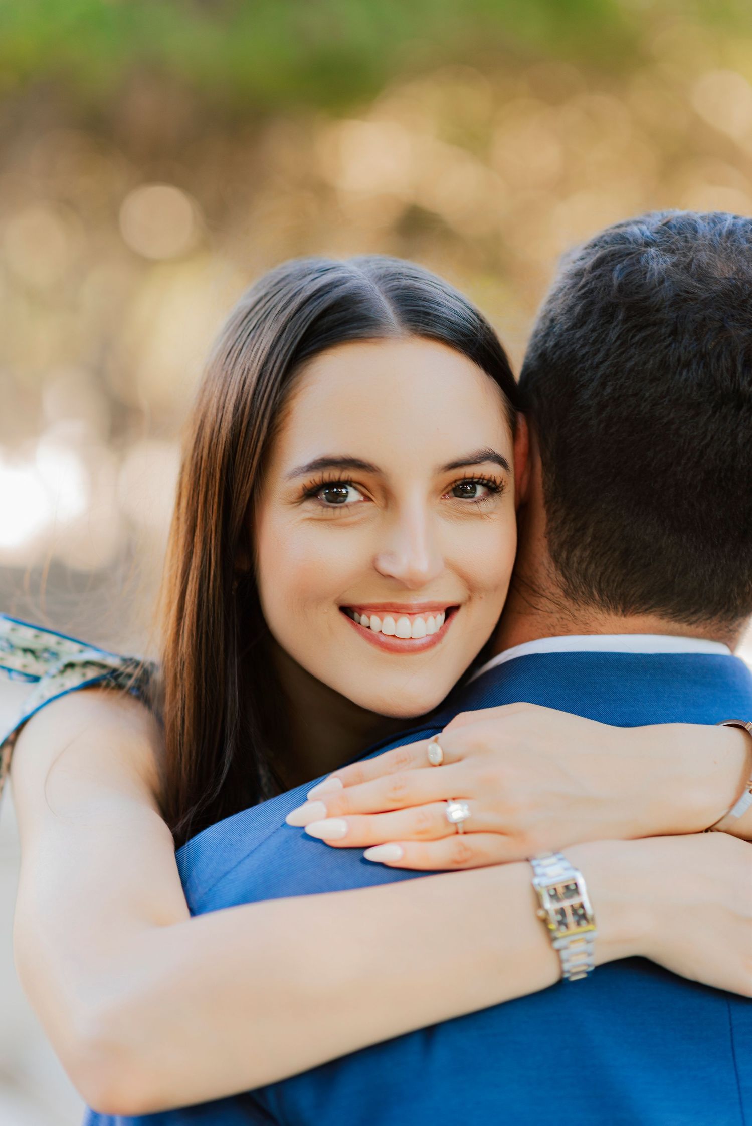 Engaged couple holding hands at sunset in Fort Worth engagement session