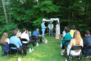 Candid photo of marriage ceremony during wedding photo session.