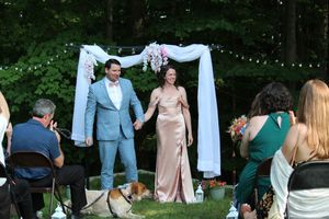 Candid photo of marriage ceremony during wedding photo session.