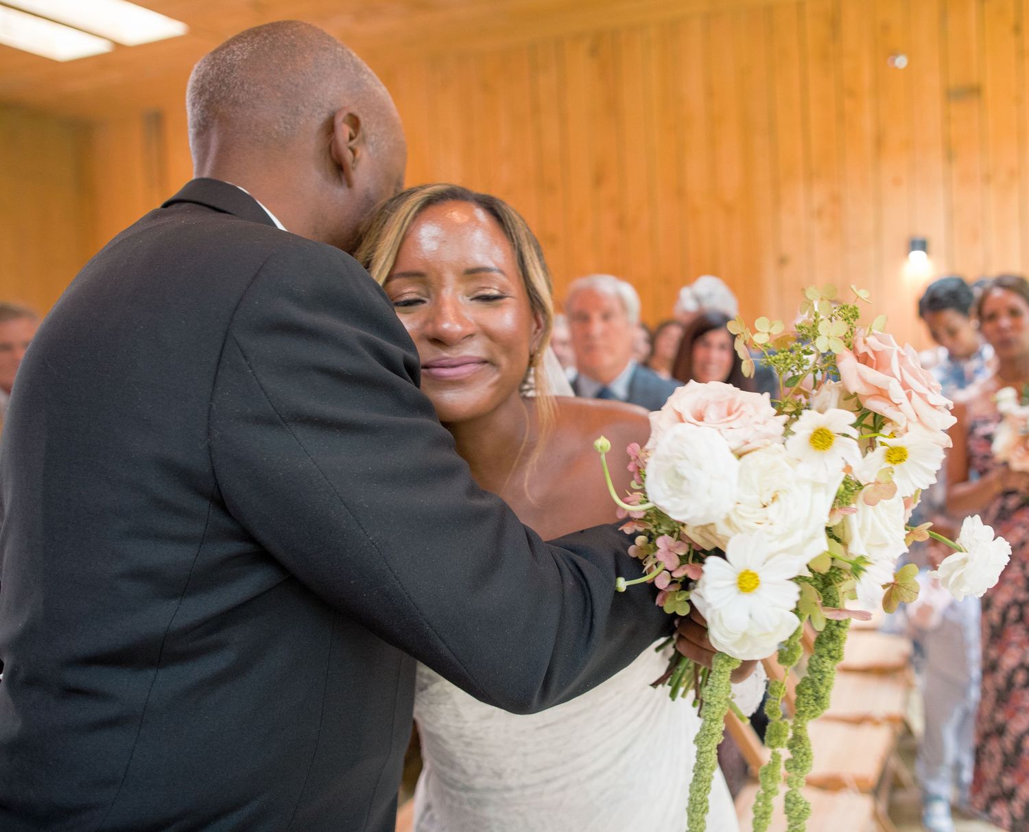 A series of candid wedding photos shows tender moments between newlyweds during their special celebration.