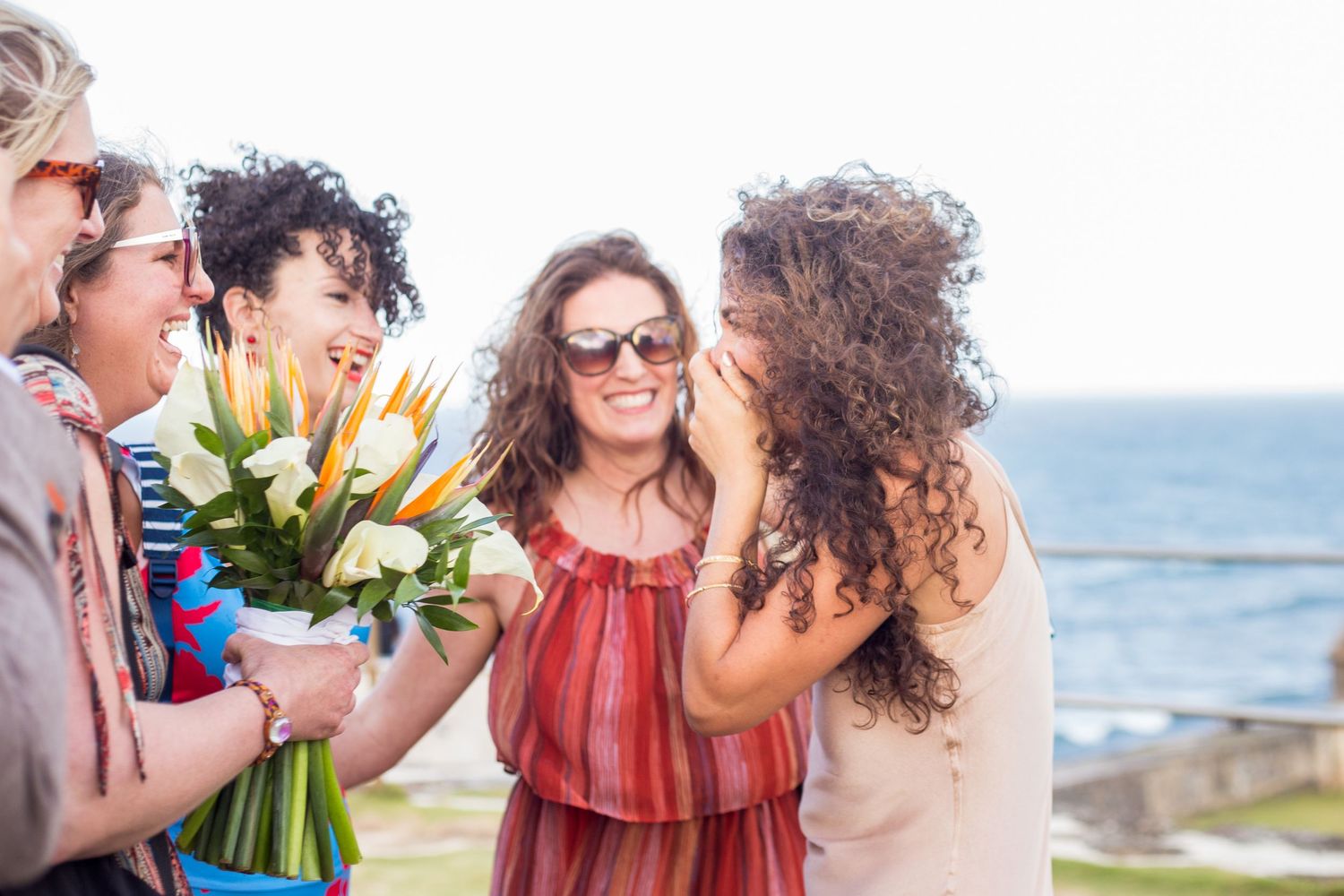 Surprise wedding. Bride and friends. El Morro. Old San Juan, Puerto Rico.