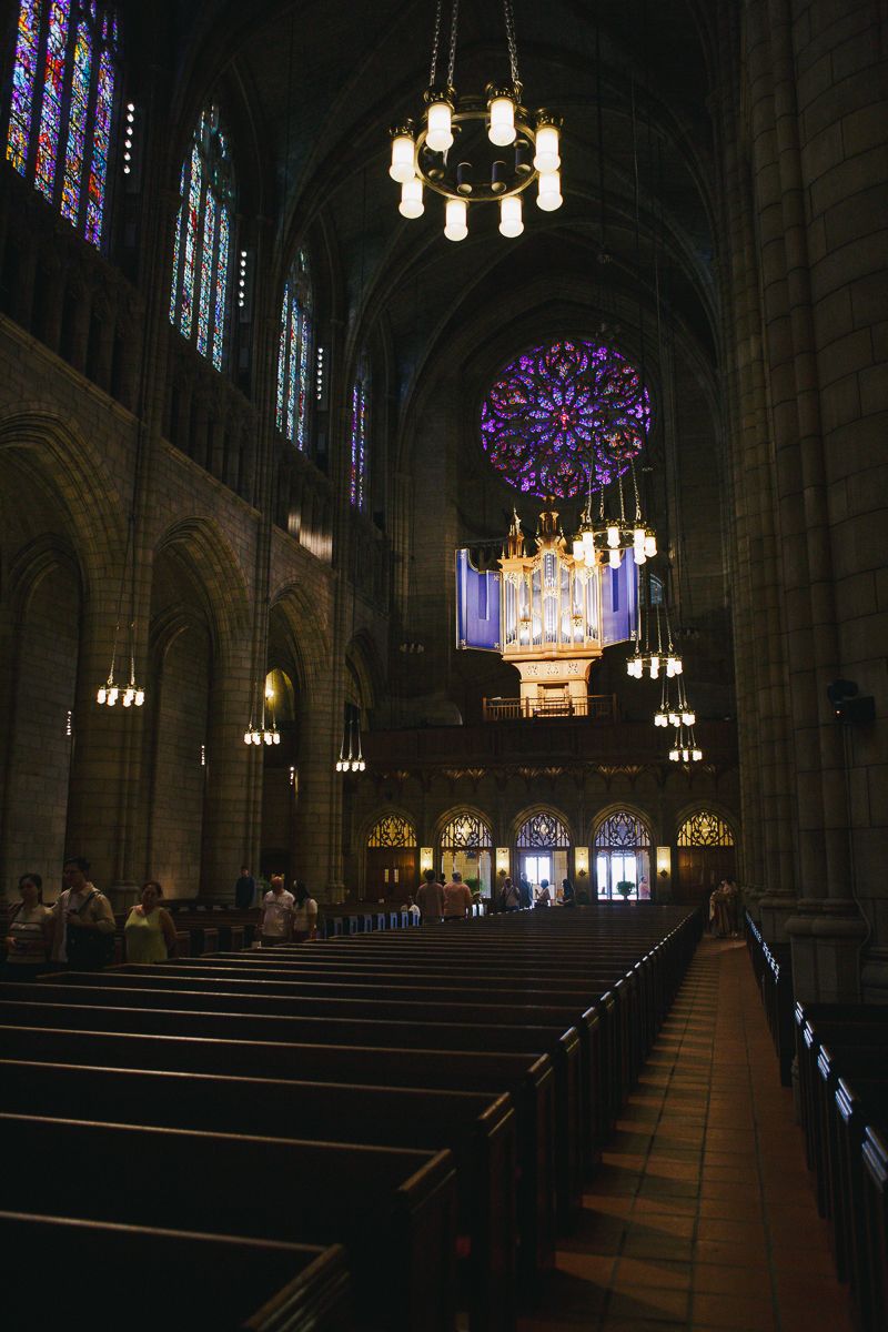 St. Thomas Church entrance with stained glass windows photographed by NYC family photographer Paula Brearley