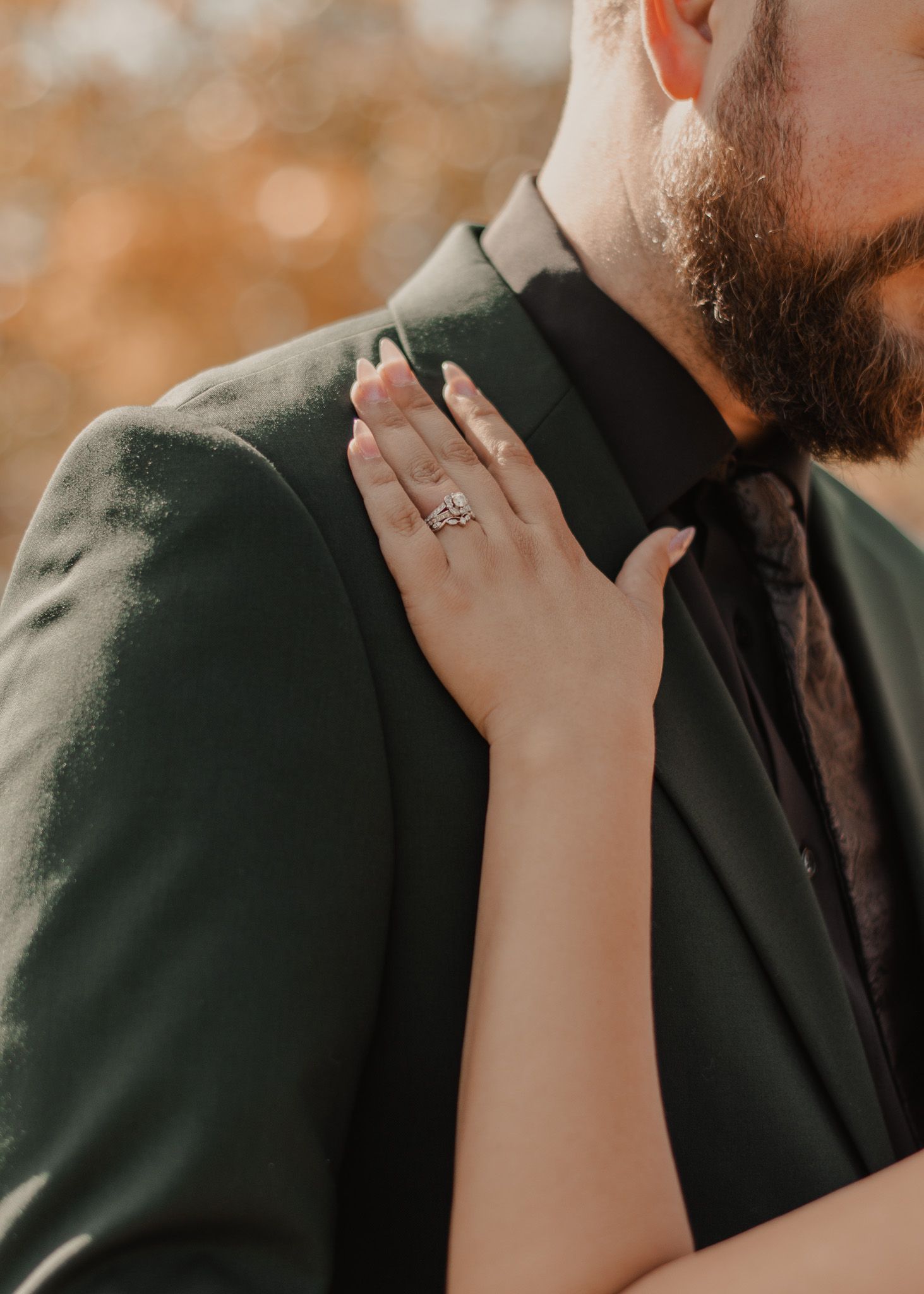 Close-up of engagement ring, showcasing intricate details and sparkle, ideal for romantic shoots.