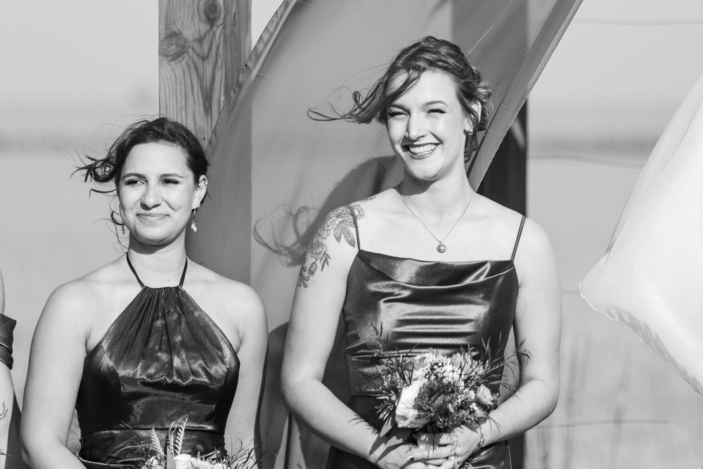 A collage of women in black formal dresses smiling and posing for photos at a special event.