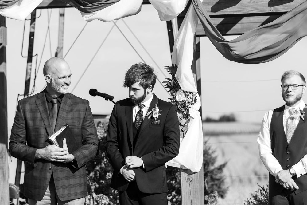 A collection of black and white wedding photos showing guests and couples at various outdoor ceremonies.