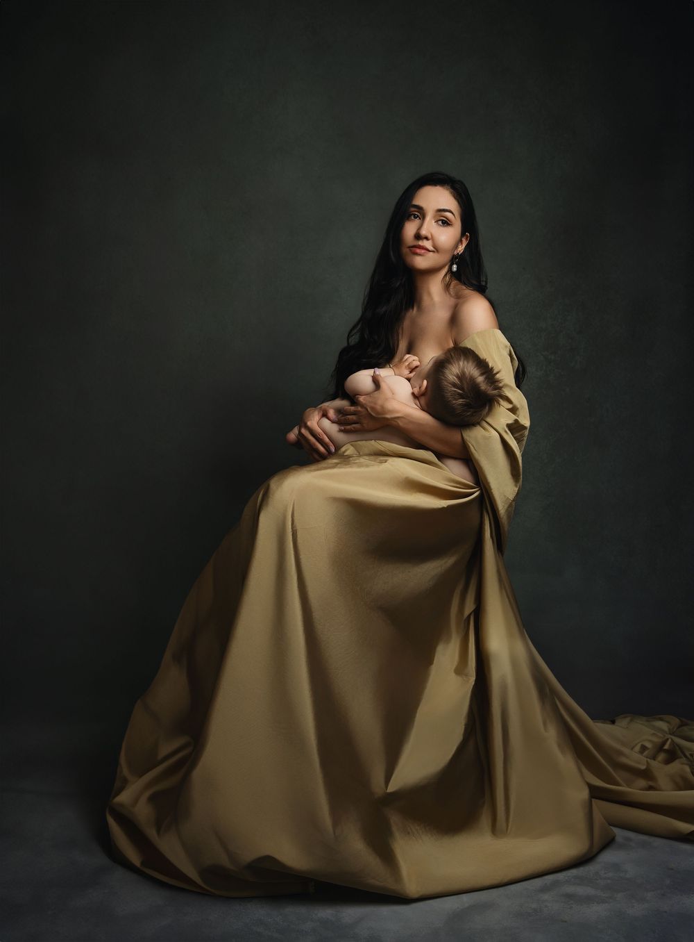 Artistic fashion portrait series showing a model in flowing olive gown against dark background in dramatic poses.