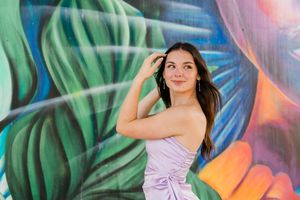Senior photography session in Northwest Ohio with graffiti backdrop in Downtown Toledo