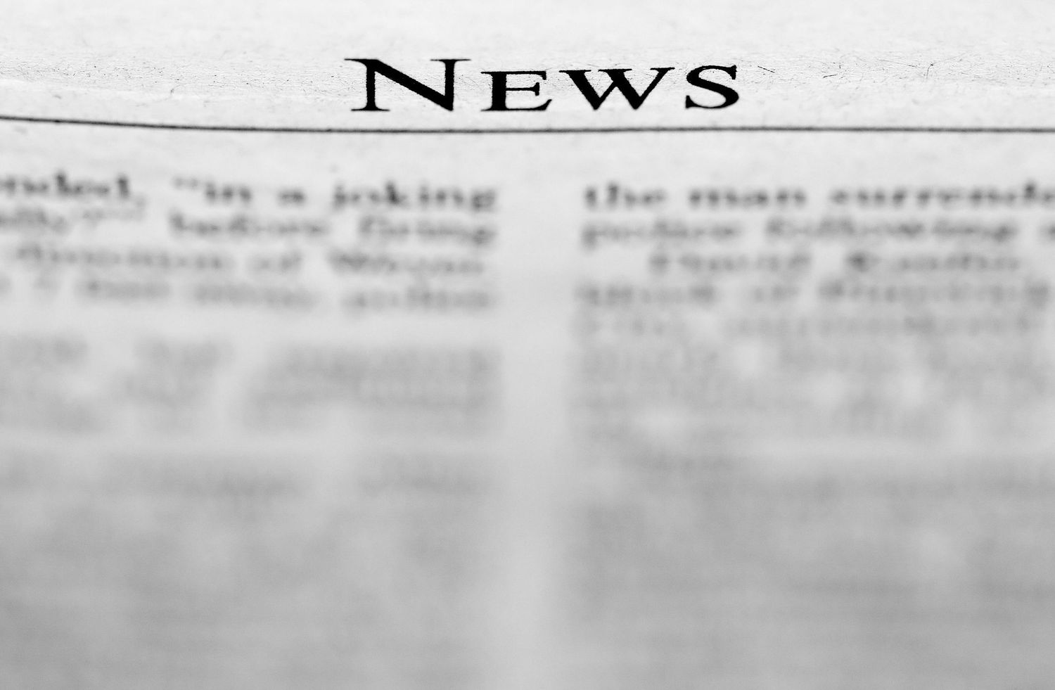 Vintage newspaper header showing the word NEWS in bold text at the top of a faded page.