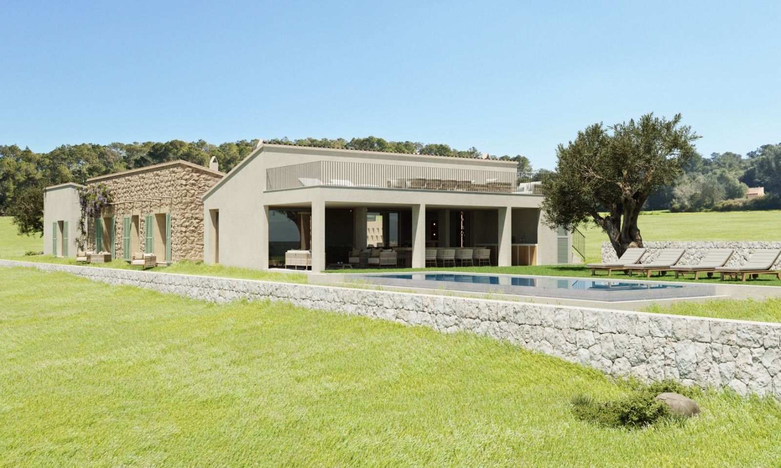 Modern stone and glass building with curved walls nestled into a grassy hillside landscape.
