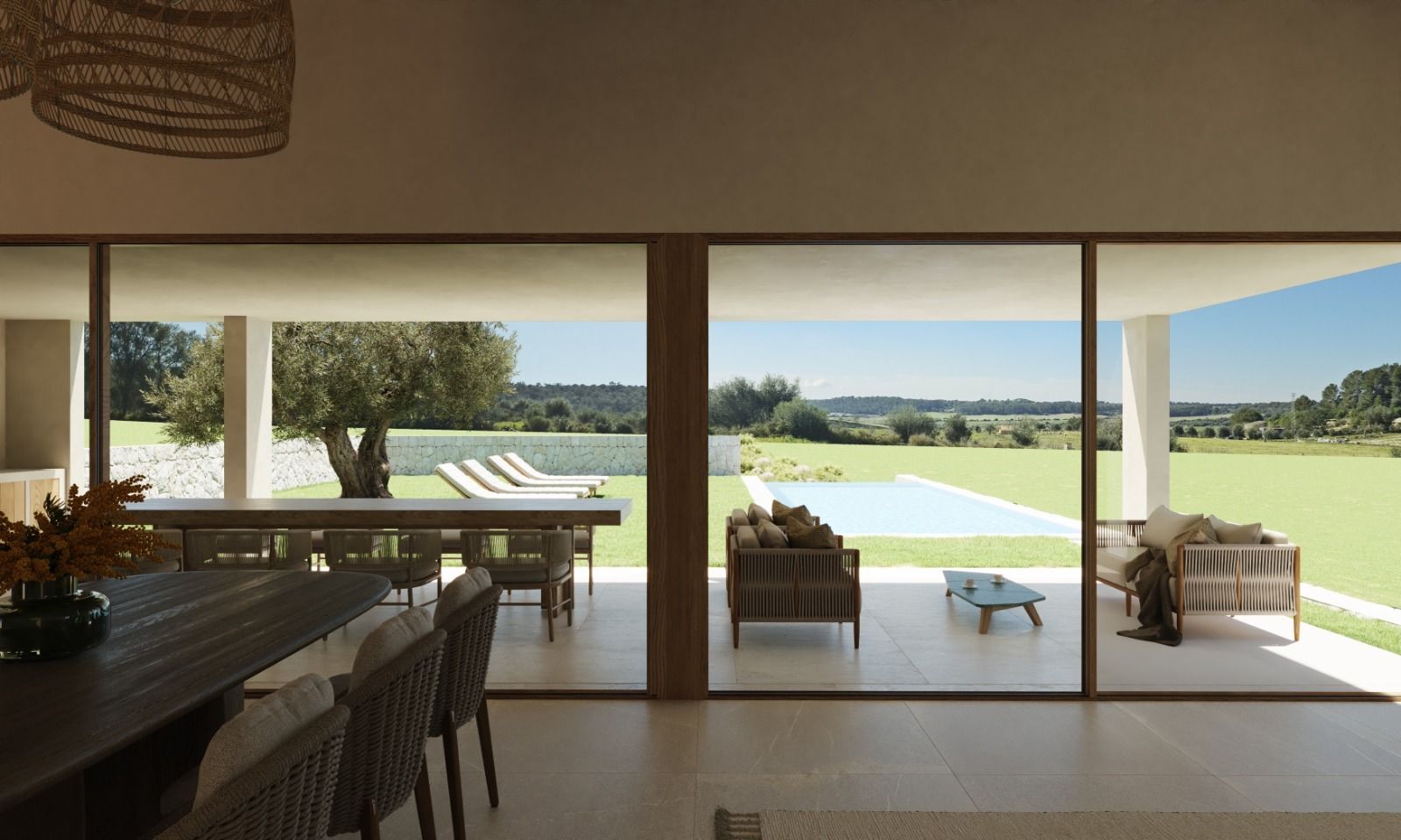 Modern minimalist living room with floor-to-ceiling windows offering panoramic views of the surrounding landscape.