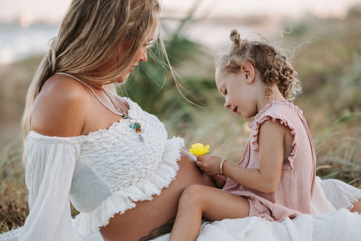 Sunset golden hour Maternity photography session overlooking Mudjimba beach on the Sunshine Coast.