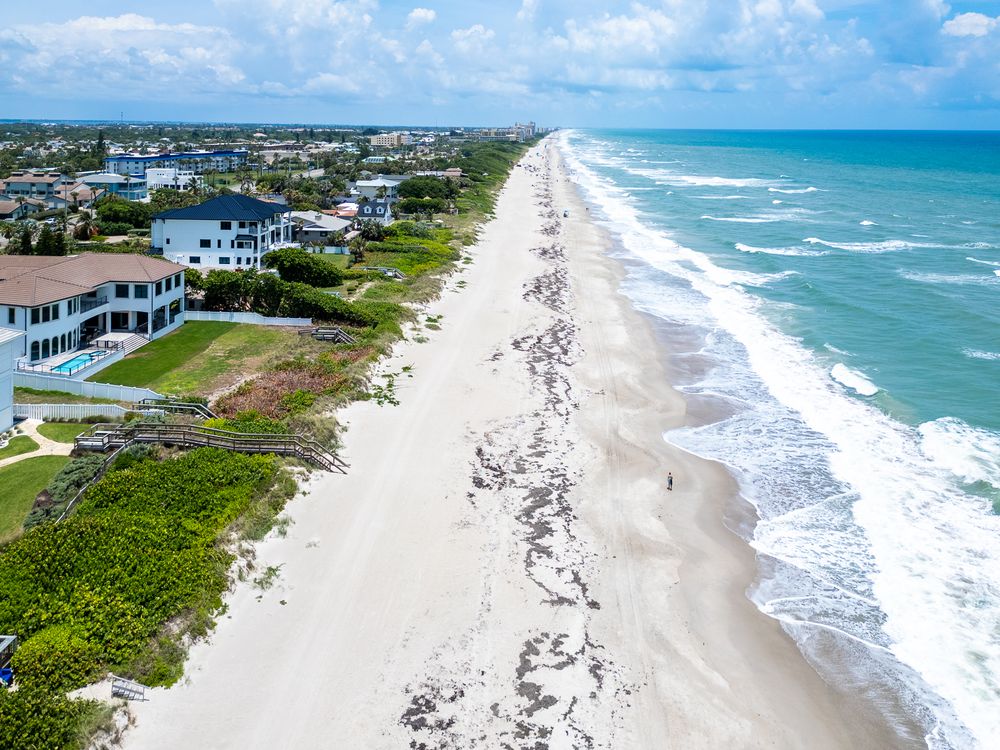 Stunning drone shot of waterfront home in Delray Beach real estate photography