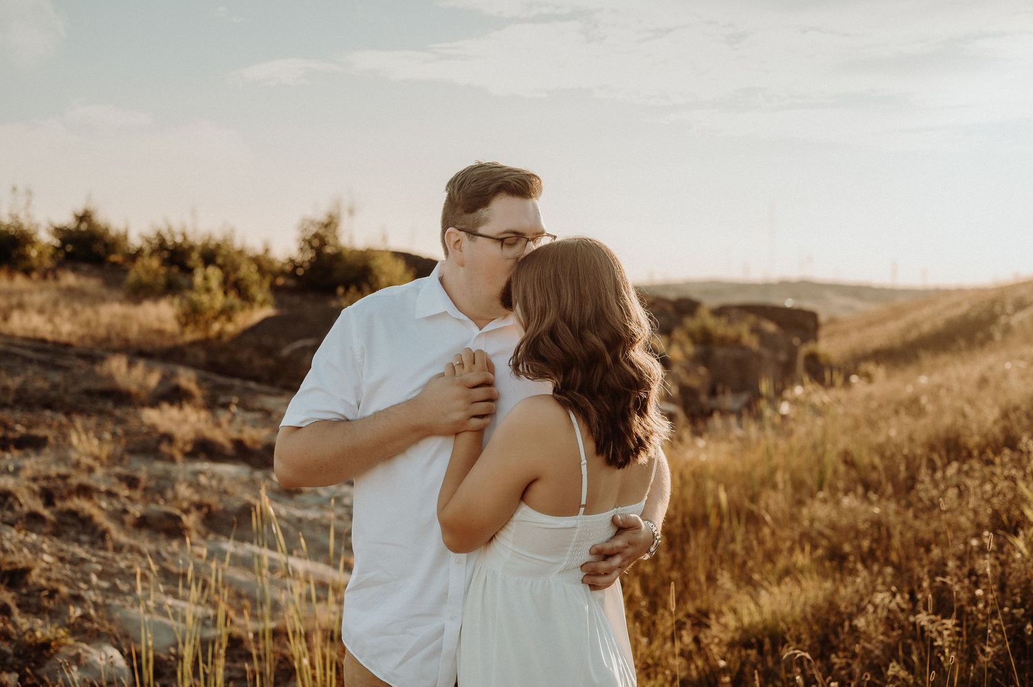Sweet candid moments captured between family members in black and white.