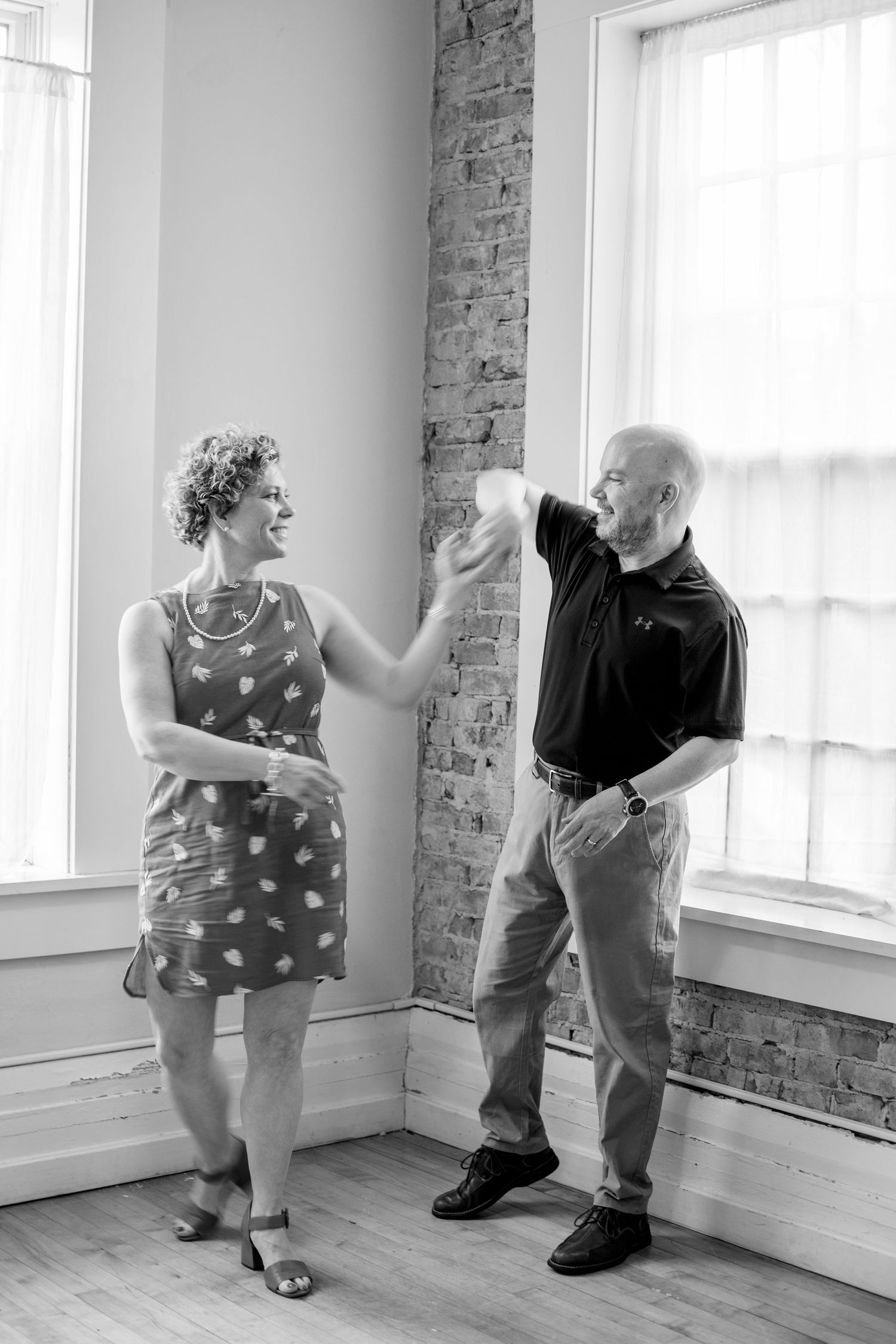 Mom and dad studio session in Cincinnati capturing luxury, polished portraits for high-end family clients