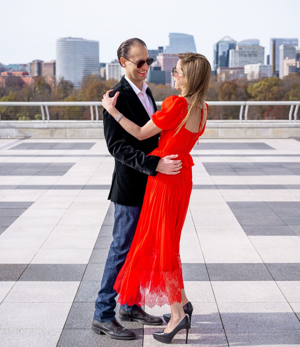 Elegant family photo session at the Kennedy Center in Washington, D.C., featuring stunning indoor chandeliers, panoramic