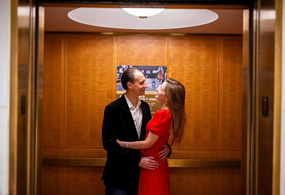 Elegant family photo session at the Kennedy Center in Washington, D.C., featuring stunning indoor chandeliers, panoramic