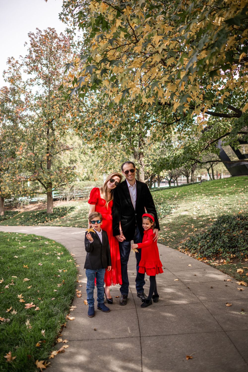 Elegant family photo session at the Kennedy Center in Washington, D.C., featuring stunning indoor chandeliers, panoramic