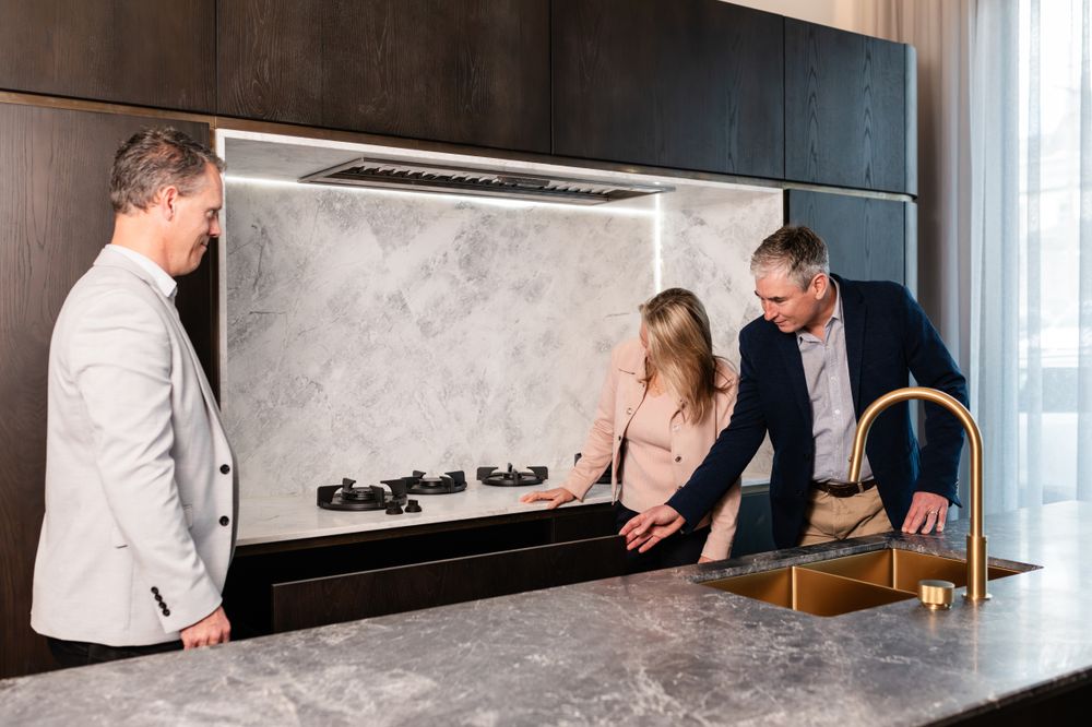 Luxury kitchen featuring marble countertops and minimalist design elements.