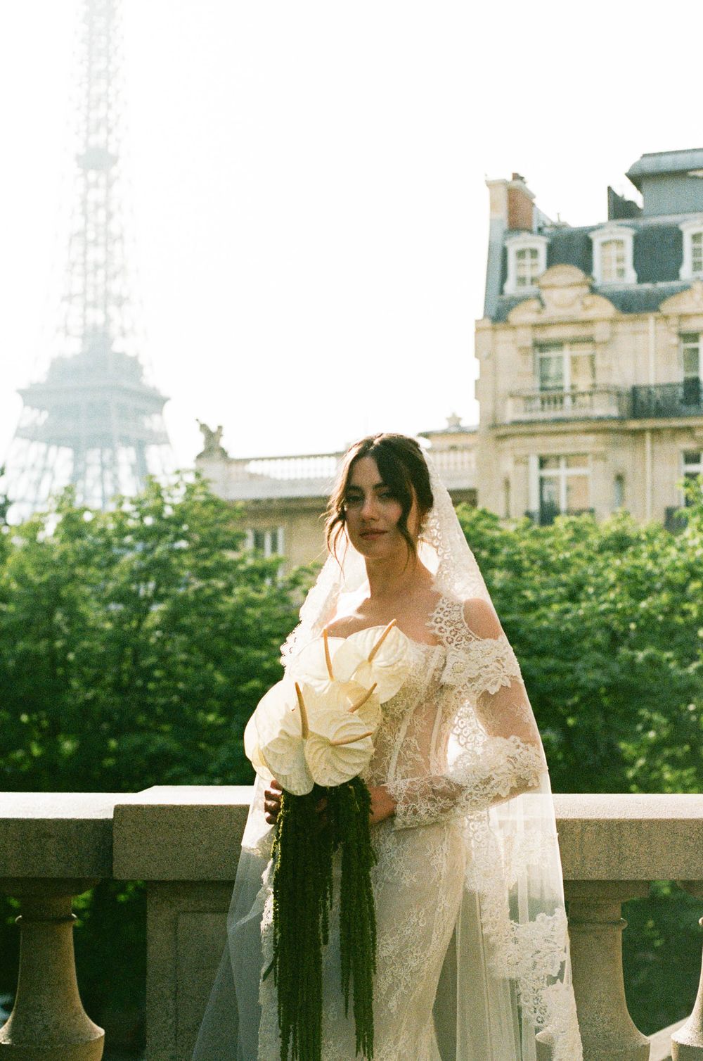 A dreamy sequence of wedding photos with a white lace dress. Paris cinematic wedding photography. Paris film wedding photographer. film