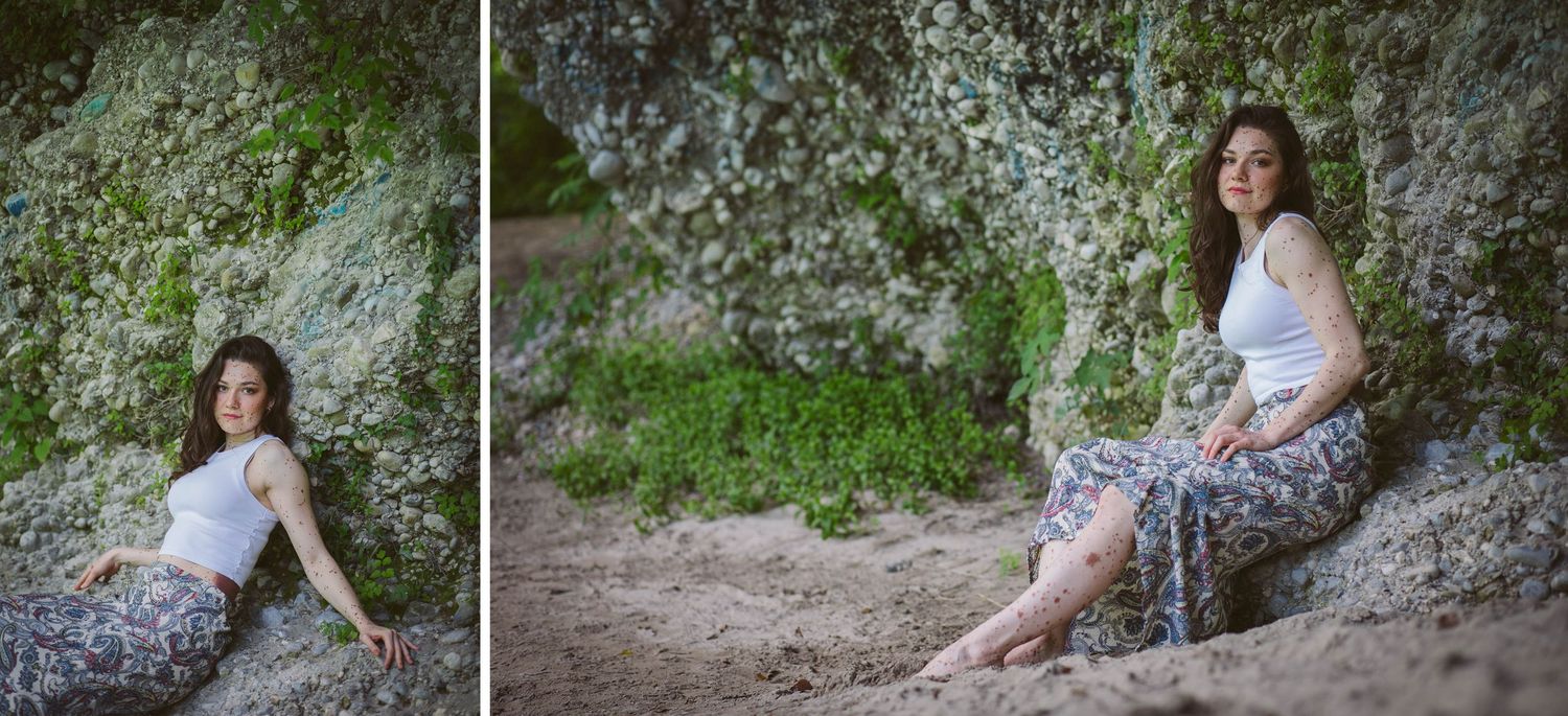 Spring portrait session with white blossoms and floral skirt set against a natural outdoor backdrop.