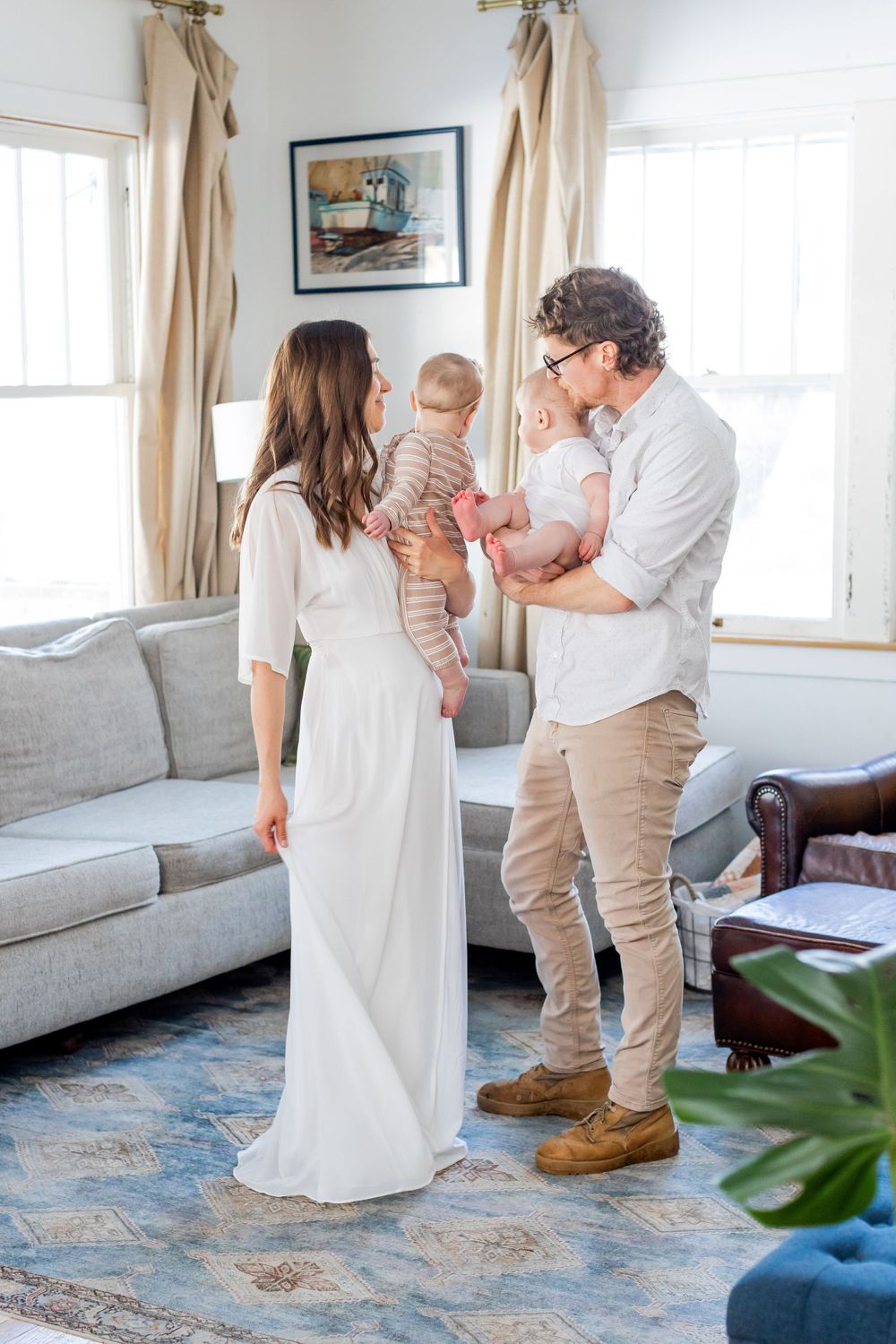 Family sharing intimate moment in bright living room in Springfield, Missouri.