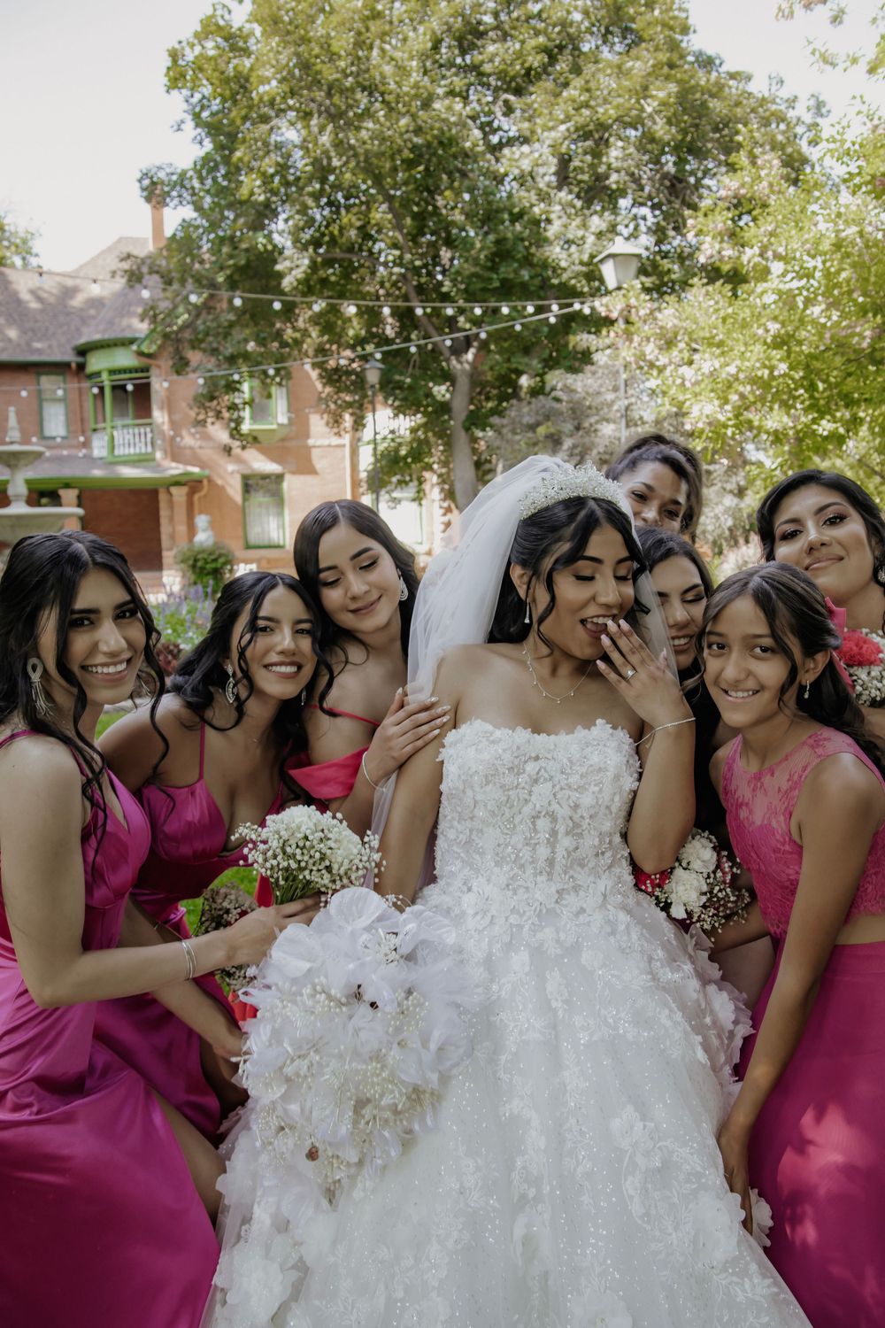 Bride poses with bridesmaids