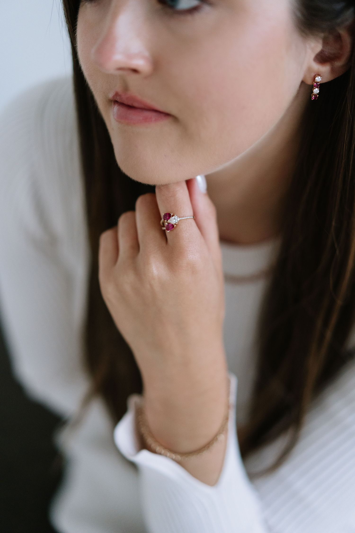 Soft focus beauty shots featuring delicate jewelry and natural makeup.