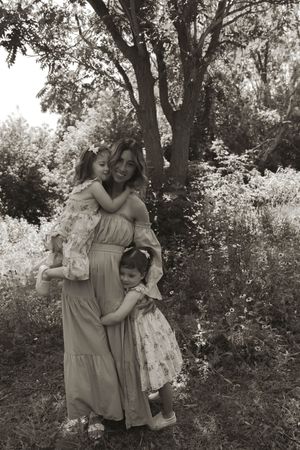A heartwarming black and white photo series showing tender moments in a garden setting.