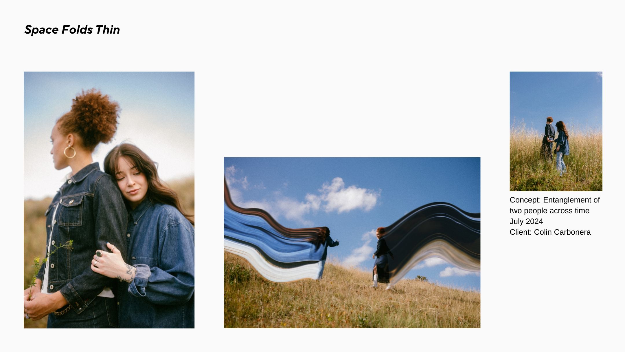 A young couple embraces in nature, standing next to a field of flowing fabric against a sunny sky and grassy meadow.
