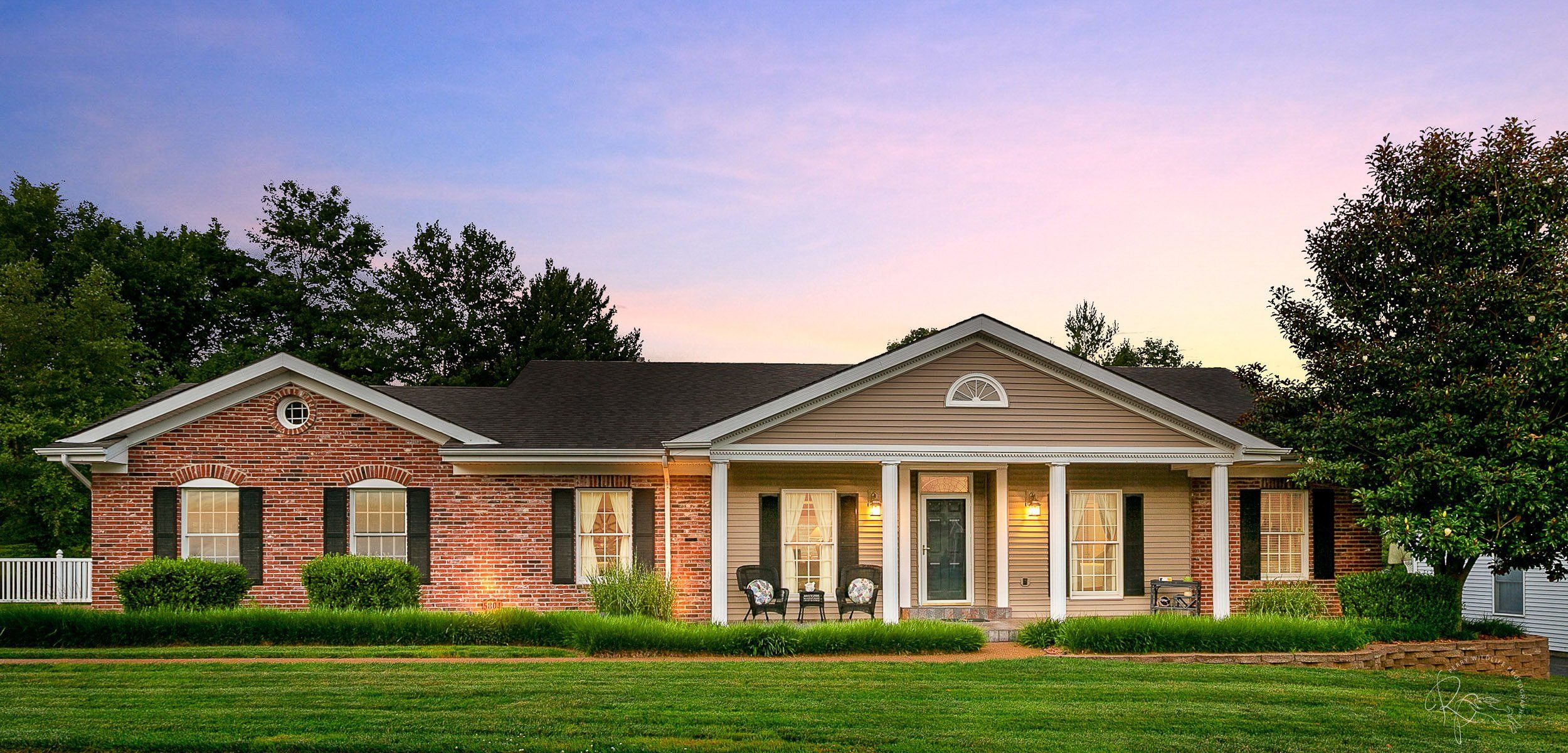 A photo collage of ranch-style brick homes featuring manicured lawns and white trim exterior details at dusk.