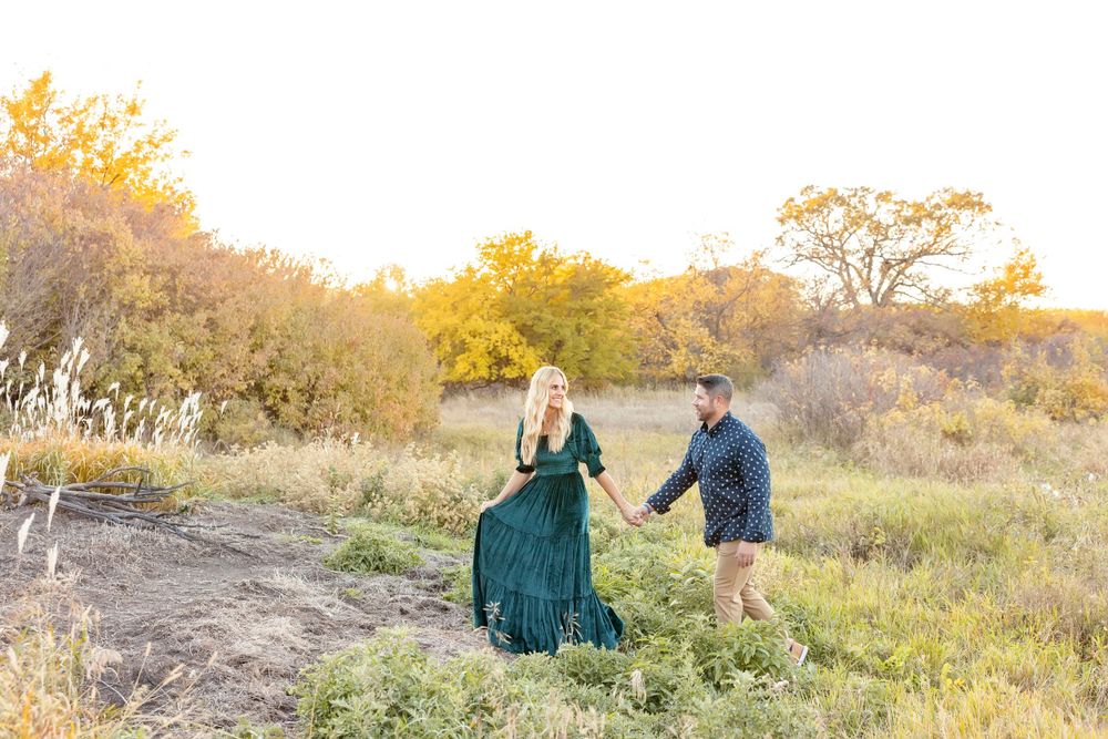 Outdoor family photoshoot in natural setting with fall foliage. Clear Lake Photographer. Mason City Photographer.