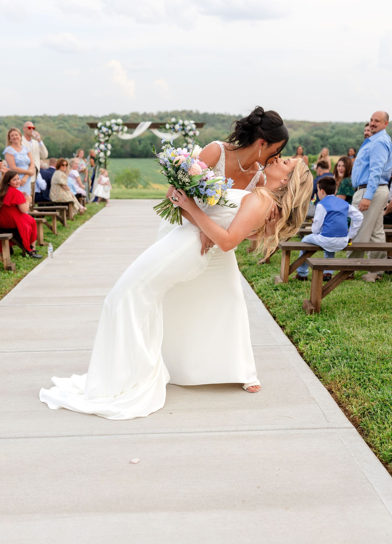 Romantic golden hour wedding portraits showing tender moments between newlyweds.