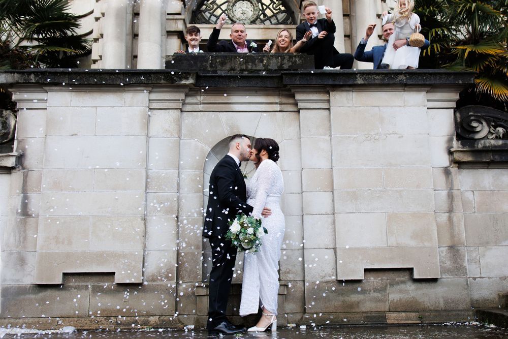 wedding photography couple and confetti stockport registry office marble staircase Greater Manchester Tameside