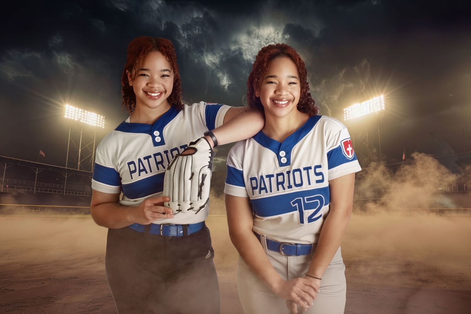 Creative studio sports photography of twin baseball players highlighting athletic intensity and team spirit.