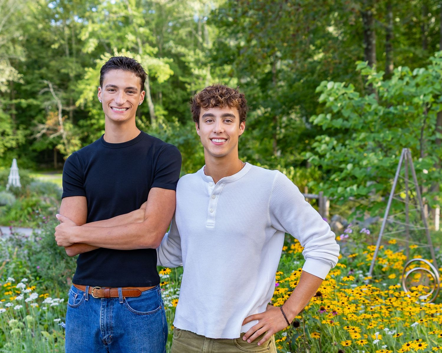 Twins High School Senior Portrait Session people sitting on stone steps wearing casual summer outfits in Concord, MA outside Boston.