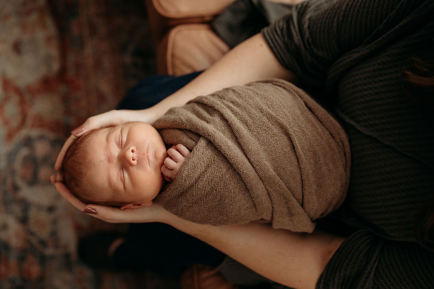 Warm toned artistic photography setup with cozy brown textiles.