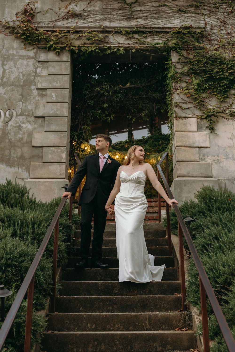 Wedding couple portraits on the brick stairs at Summerour Studio in Atlanta, Georgia