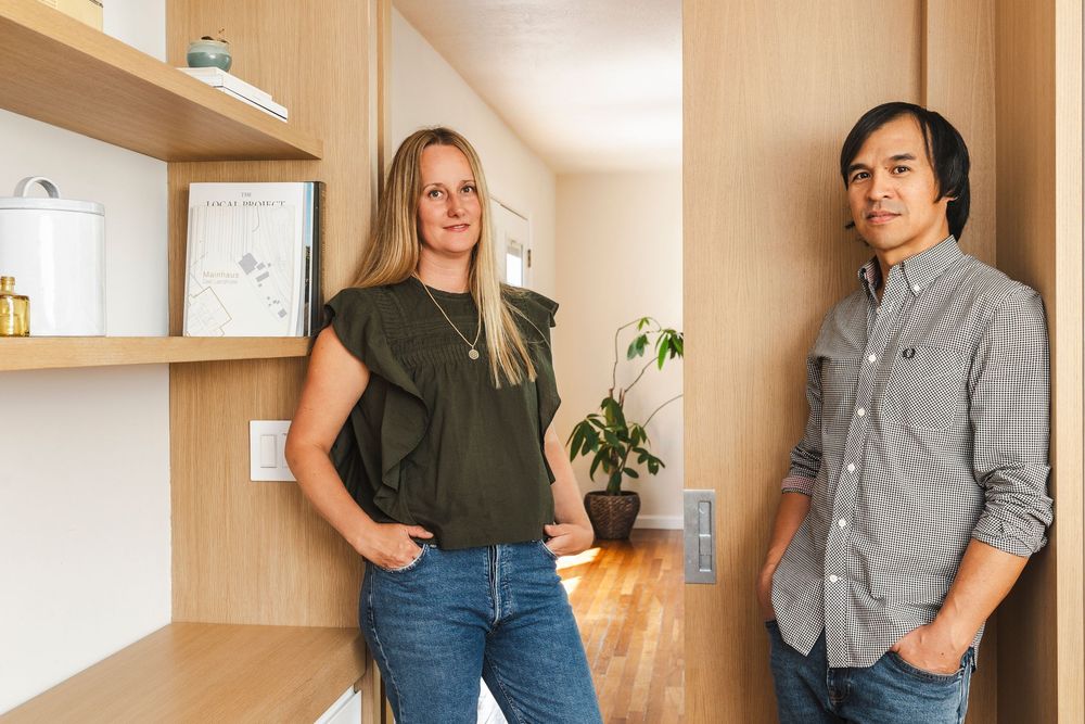 A series of photos showing a person in a gray button-down shirt and jeans standing against a beige wall.